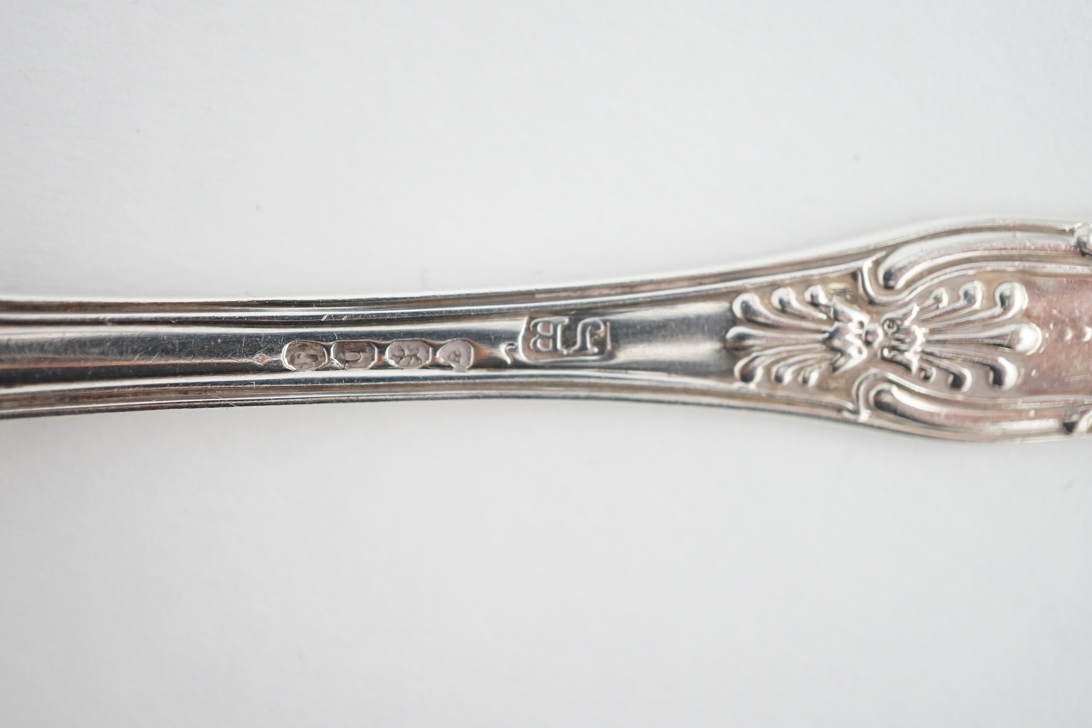 A harlequin set of eight Georgian and Victorian silver Kings pattern teaspoons, various dates and makers